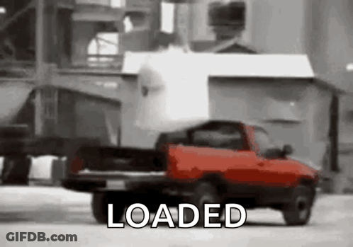 Red Truck On Snowy Road Building Saying Loaded GIF