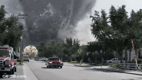 Red Truck Parked Beside Smoke Cloud GIF
