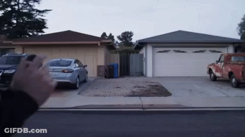 Red Truck Parked In Front Of Garage GIF