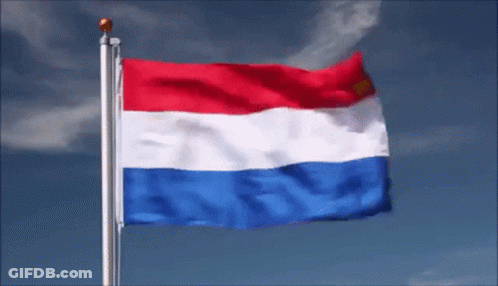 Red White And Blue Flag Waving In The Wind GIF