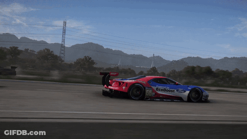 Red White And Blue Ford EcoBoost Race Car On Track GIF