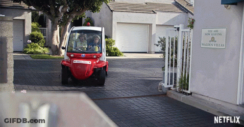 Red White Vehicle Passing Walden Villas Leasing Sign GIF