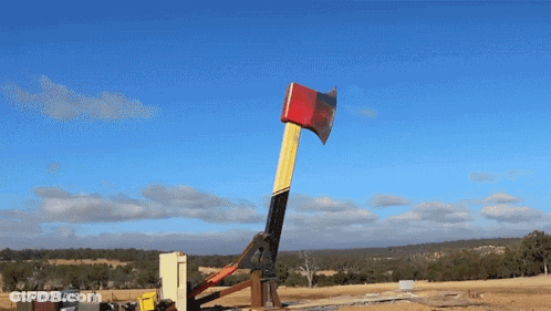 Red Yellow Axe Thrown By Crane Not Building GIF