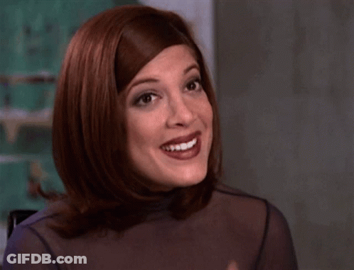 Redhaired Woman Smiling Wearing Ring GIF