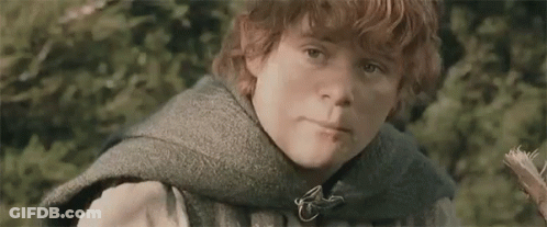 Redhead Boy Holding Flower In Woods GIF