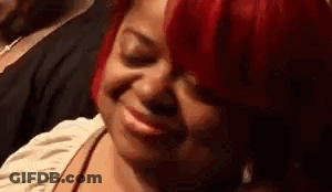Redhead Smiling Eyes Closed In Crowd GIF