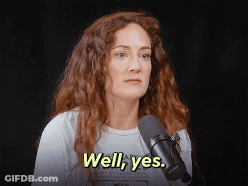 Redhead Woman At Microphone Saying Well Yes GIF