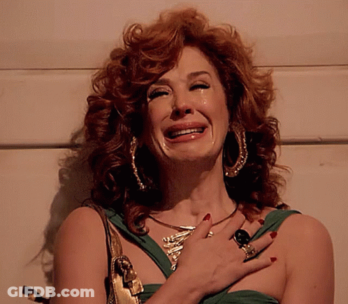 Redhead Woman Crying With Gold Ring GIF