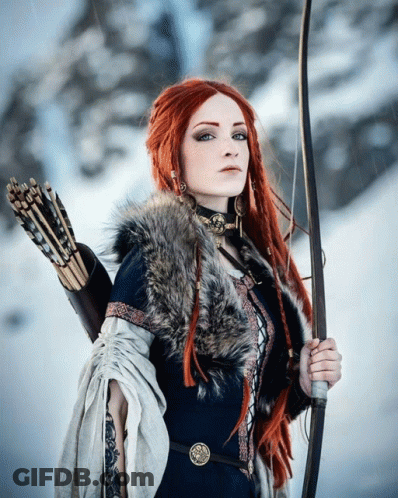Redhead Woman Holding Bow And Arrow GIF