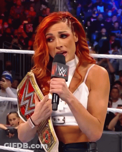 Redhead Woman Holding Wrestling Belt With W Mic GIF
