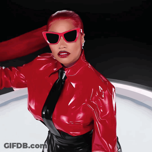Redhead Woman In Sunglasses And Red Tie GIF