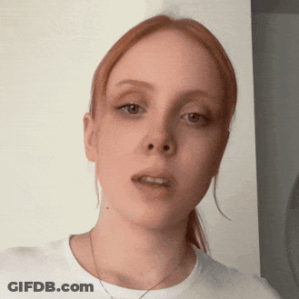 Redhead Woman In White T-Shirt GIF