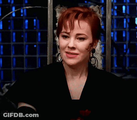 Redhead Woman Making Funny Face Saying Day-O GIF