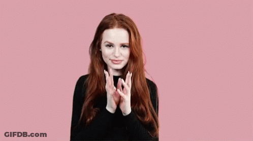 Redhead Woman Making Funny Face With Hands Together GIF
