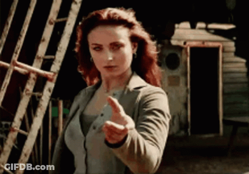 Redhead Woman Pointing Finger At Ladder GIF