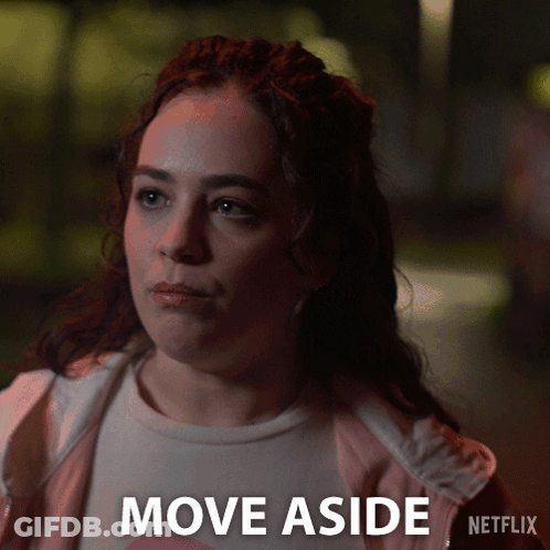 Redhead Woman Saying Move Aside Netflix Ad GIF