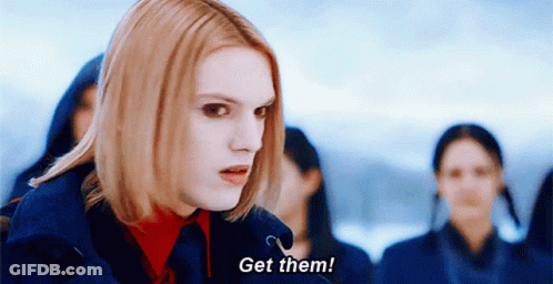 Redhead Woman Says Get Them GIF
