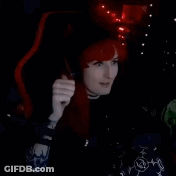 Redhead Woman Sitting Making OK Sign GIF