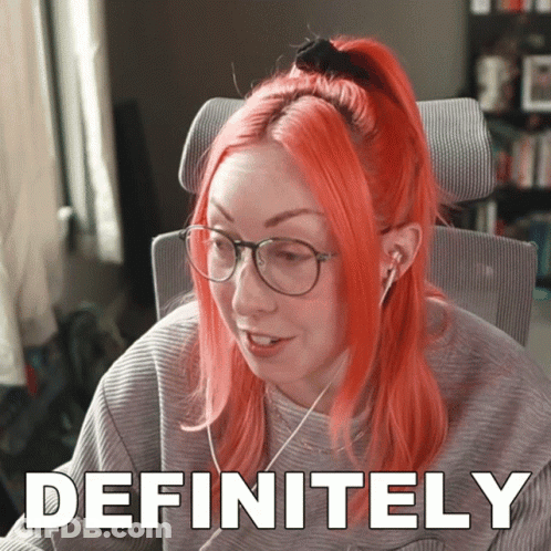 Redhead Woman With Glasses And Headphones Saying Definitely GIF