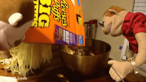 Reese's Puffs Poured Into Mixing Bowl GIF