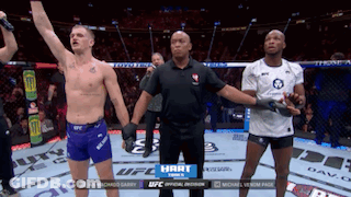 Referee Between Two UFC Fighters GIF