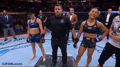 Referee Between Two Women In UFC Outfits GIF