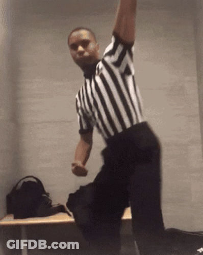 Referee Dancing In Black And White GIF