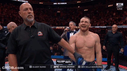 Referee Holding Up Fighter's Arm GIF