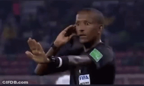 Referee In Black Shirt Saying FIFA On Sleeve GIF