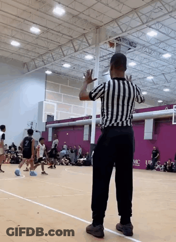 Referee In Striped Shirt Watching Basketball GIF