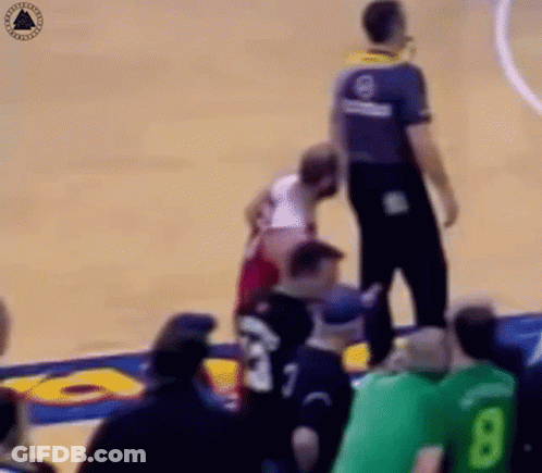 Referee Next To Basketball Player GIF