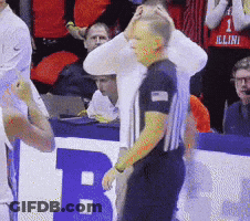Referee Standing In Front Of Sign Saying B GIF