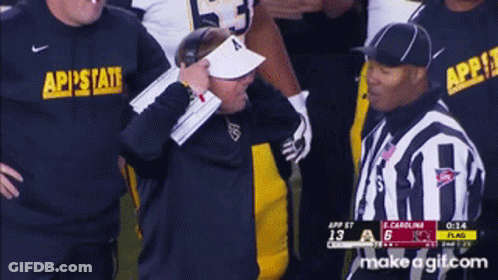 Referee Talking To Coach Wearing AP State Shirt GIF