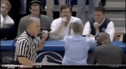 Referee Talking To Man At Screen Saying Olympics GIF