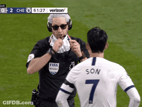 Referee Talking To Soccer Player Number 7 GIF