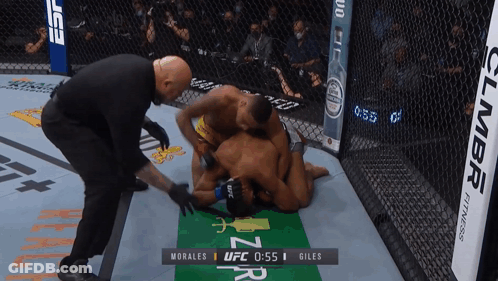Referee Watching Morales Vs Giles UFC Fight GIF