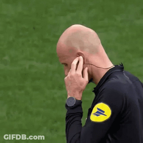 Referee Wearing Earbuds GIF
