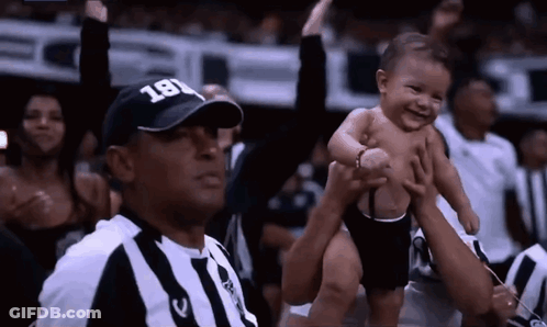 Referee Wearing Hat 181 Holding Baby GIF
