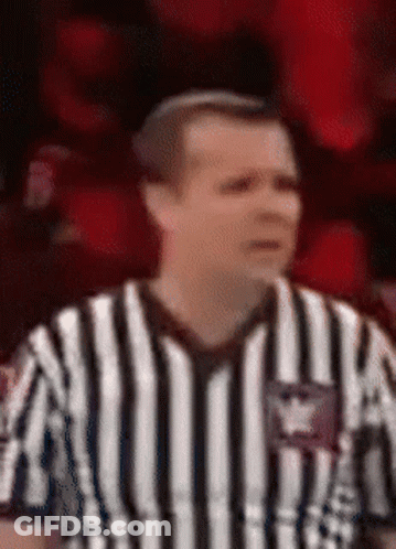 Referee With American Flag On Striped Shirt Back GIF