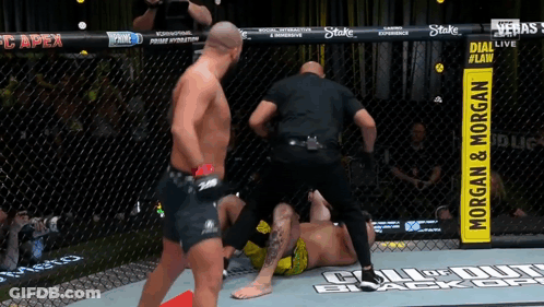 Referee With Morgan & Morgan Sign GIF