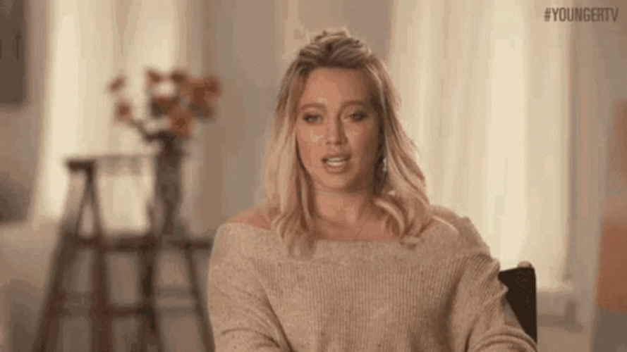 Relieved Hilary Duff GIF