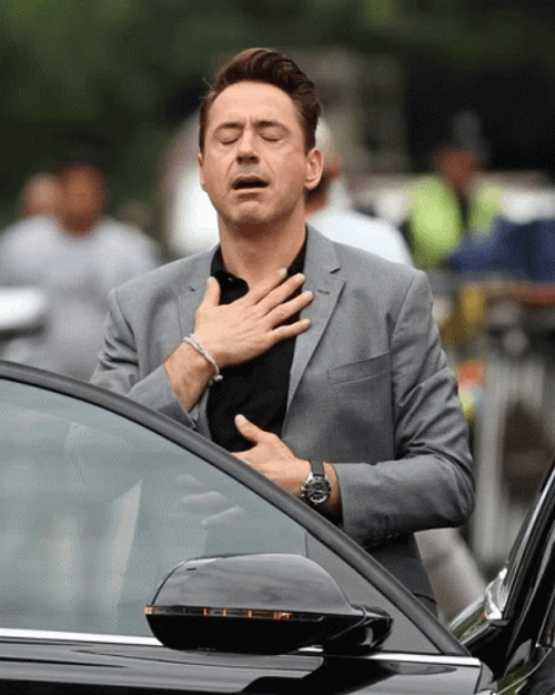 Relieved Phew Robert Downey Jr GIF