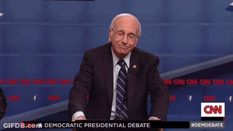Reporter Doing The Meh Face GIF