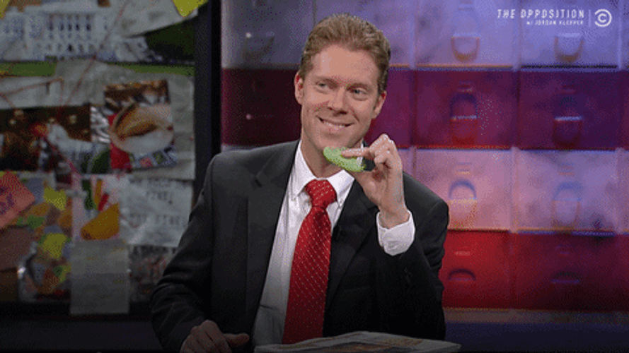 Reporter Playing Fidget Spinner GIF