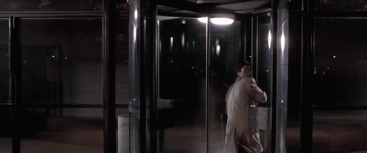 Revolving Door Patrick Bateman American Psycho GIF