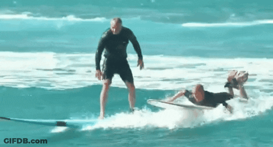 Rfk Catches Waves With Surfing GIF