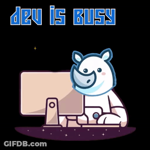 Rhino Sitting At Computer Dev Is Busy GIF