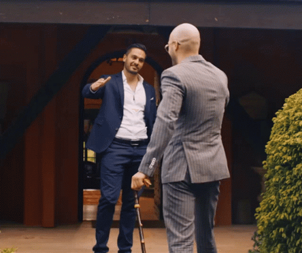 Rich Buddies Shaking Hands GIF