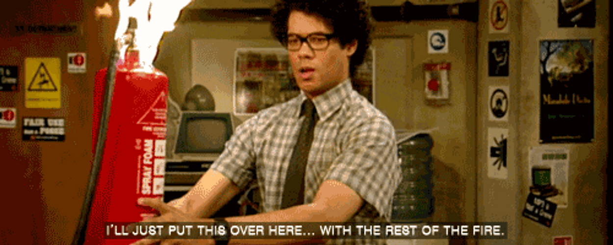 Richard Ayoade Holding Fire Extinguisher GIF