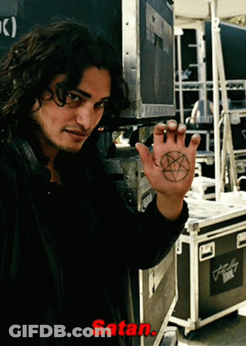 Richard Ramirez With Star In His Hand GIF
